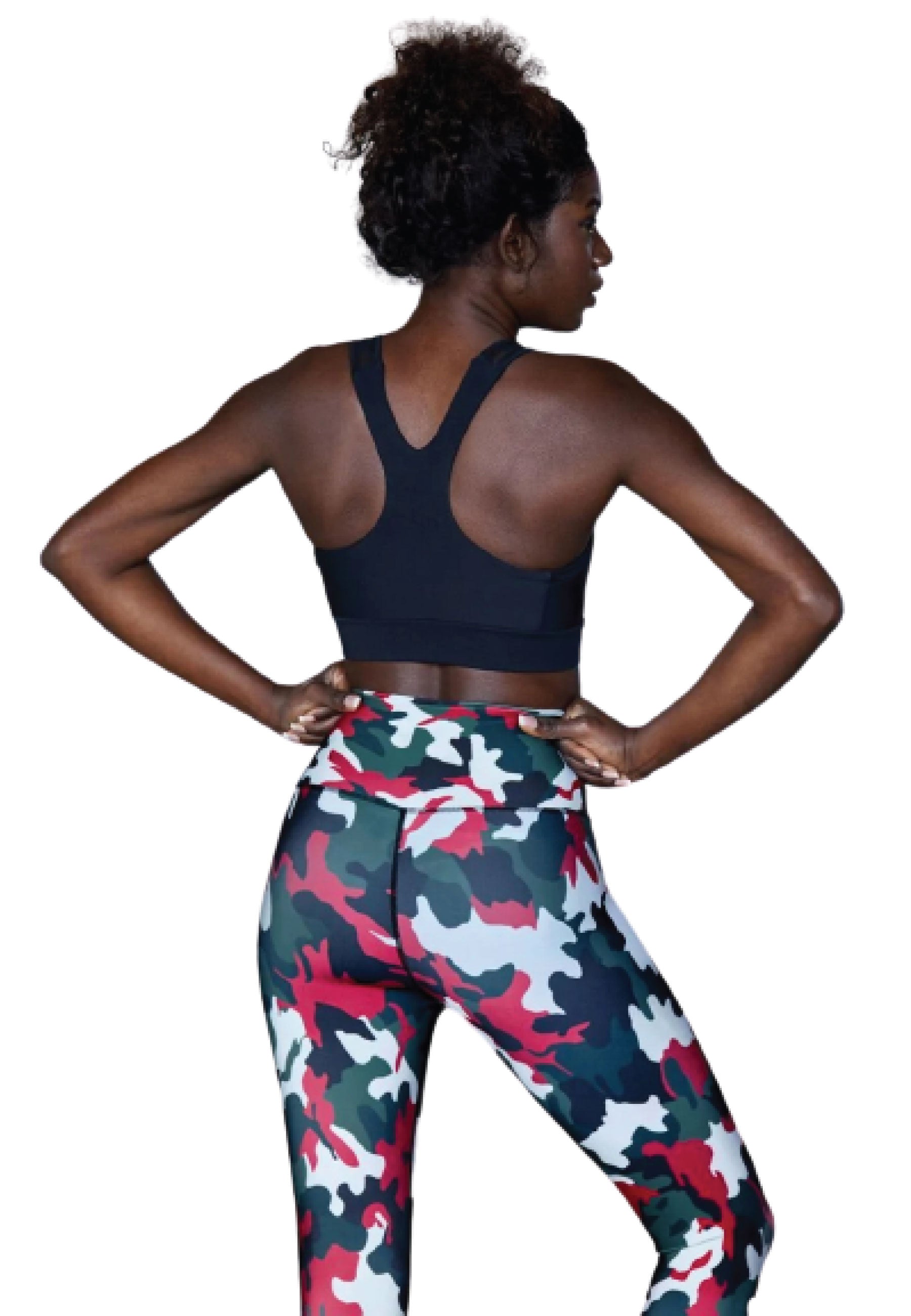 Selbstbewusste Frau in Lisminas 199 Sport Bra Tulle in Schwarz, Hände in die Hüften gestemmt.